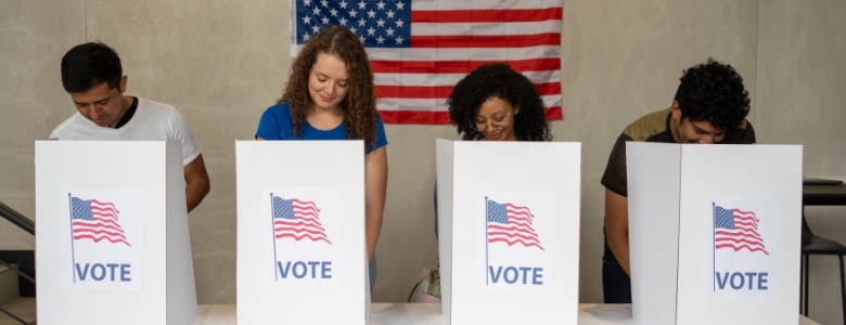 A group of young people casting votes in a US election